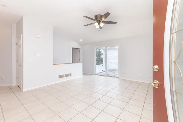 a view of an empty room and window