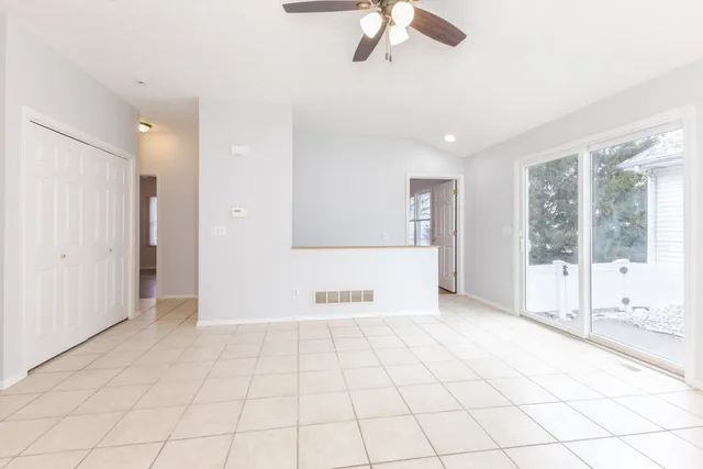 a view of an empty room and window