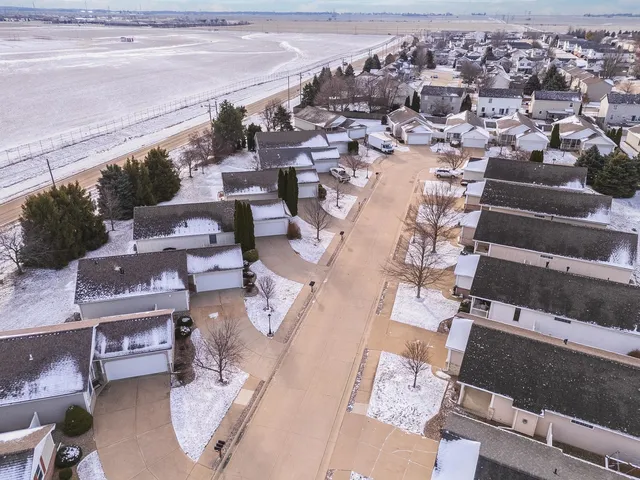 an aerial view of a city with lots of residential buildings