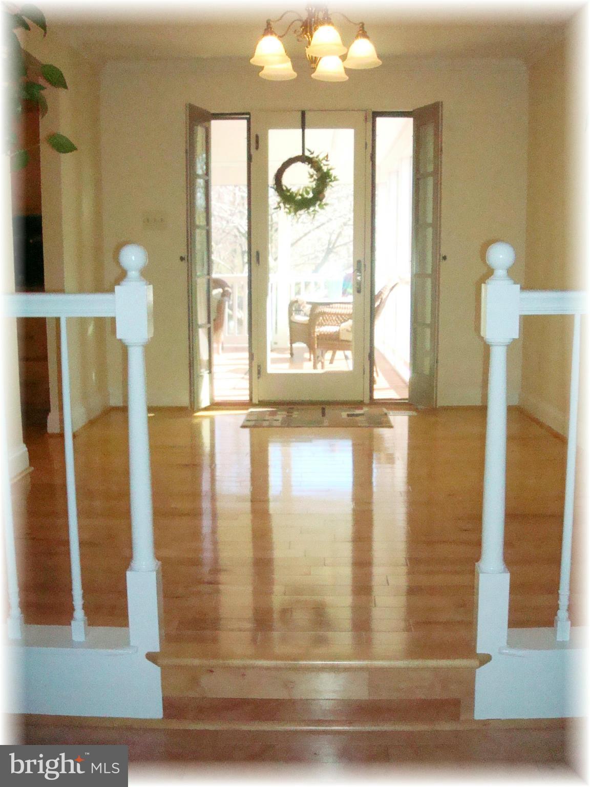 9010 Throgmorton Road Baltimore, MD 21234 - Photo 13 of 30 French door to screened porch w/hinged side lights