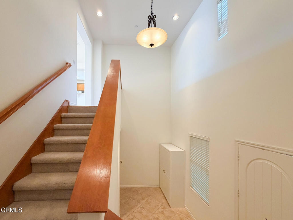 8262 Onyx Street Ventura, CA 93004 - Photo 29 of 33 a view of staircase with white walls