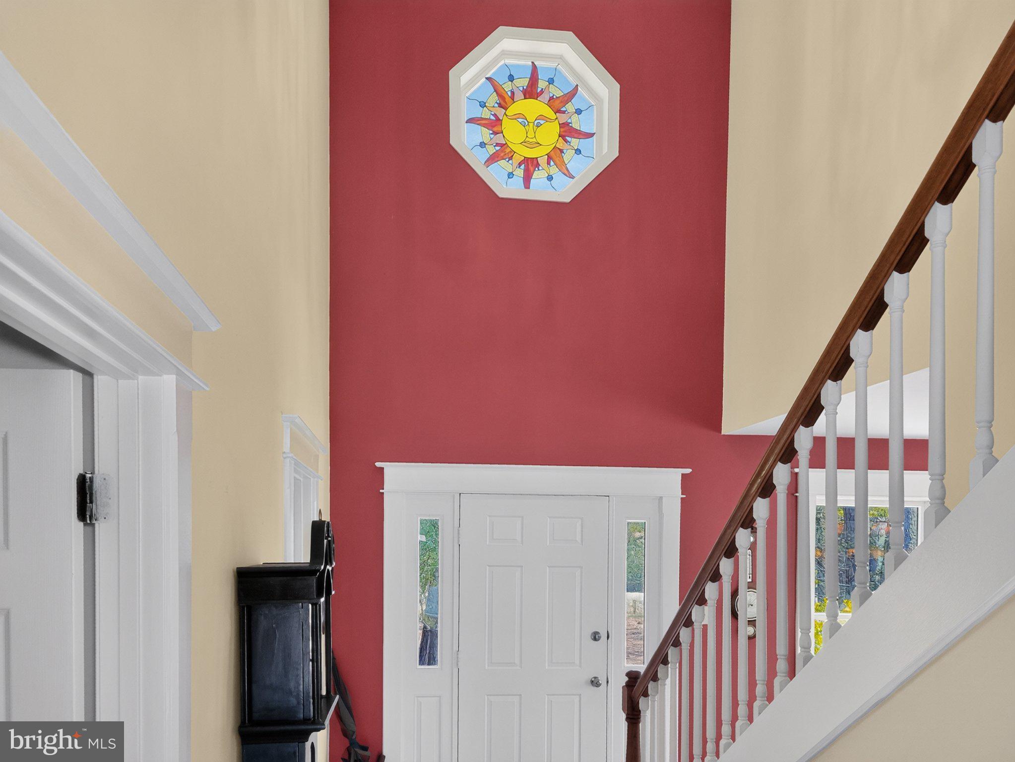 5214 David Greene Road Cambridge, MD 21613 - Photo 19 of 73 Welcoming entry with vibrant sun motif.