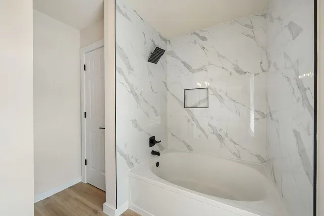 a bathroom with a bathtub