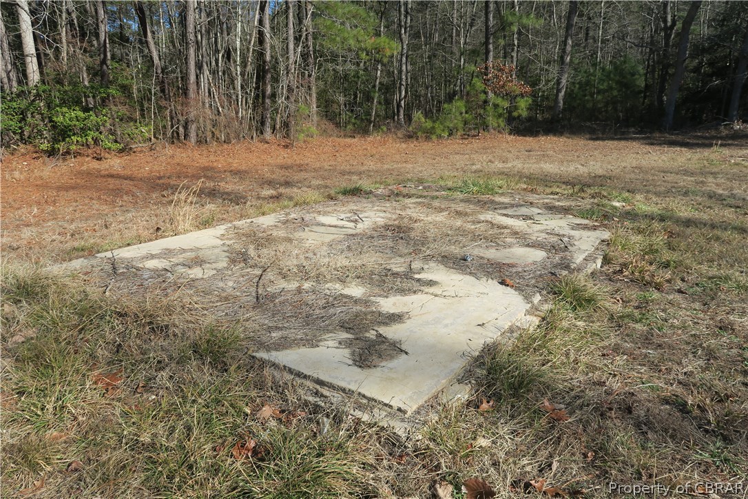 44 Senora Road Lancaster, VA 22503 - Photo 23 of 26 Concrete pads in place from previous outbuildings. Great foundation to build a shed or workshop.