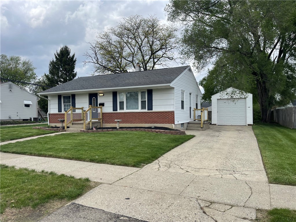 1361 Sussex Road Troy, OH 45373 - Photo 12 of 25 This charming home offers a well-maintained exterior and convenient separate garage.