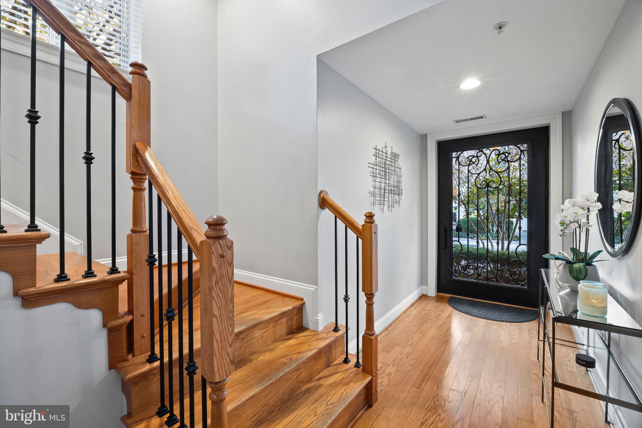 900 Valencia Court, Unit 188 Baltimore, MD 21230 - Photo 12 of 62 a view of an entryway with wooden floor and door