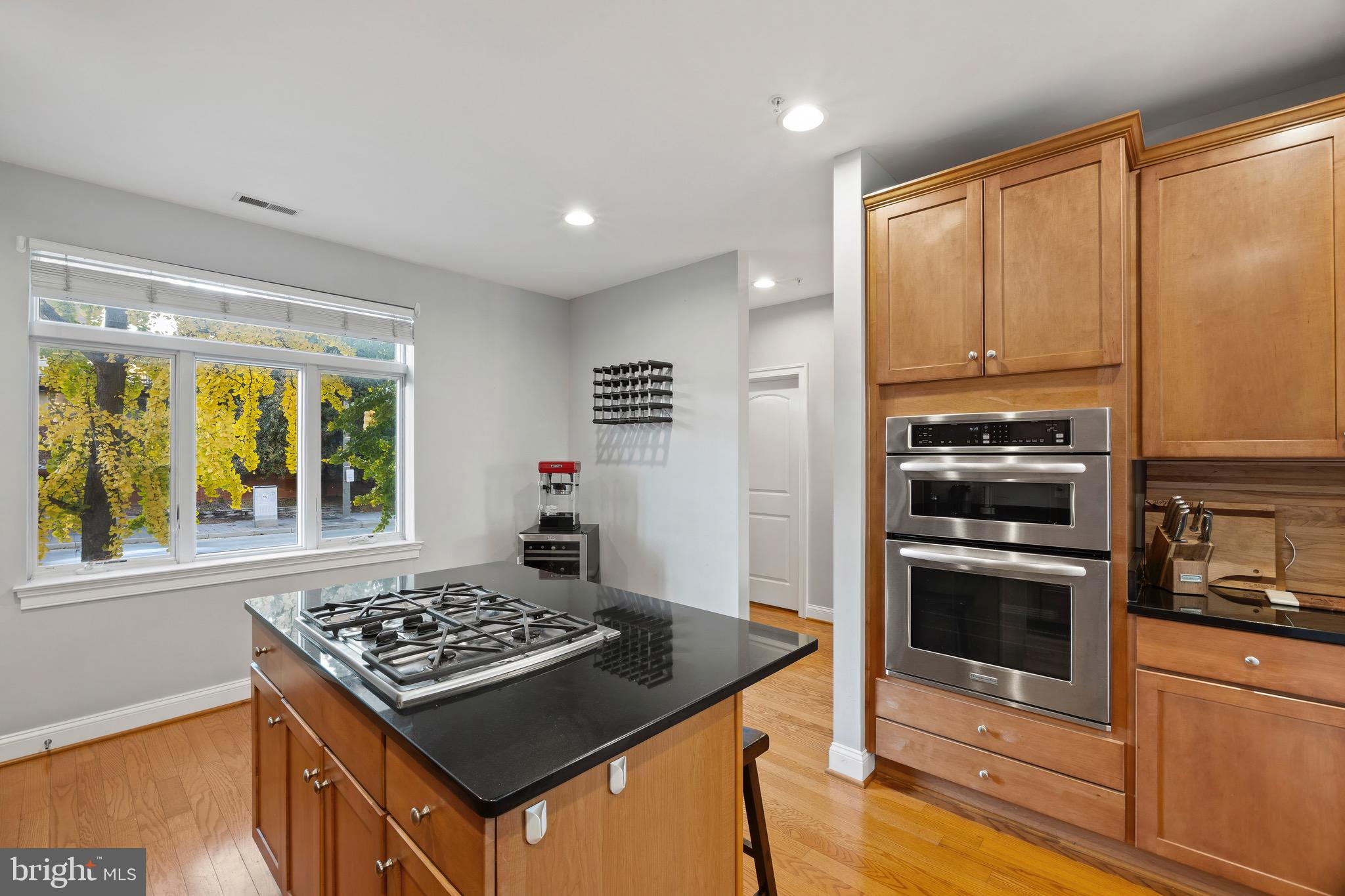 900 Valencia Court, Unit 188 Baltimore, MD 21230 - Photo 20 of 62 a kitchen with a stove a sink and a refrigerator