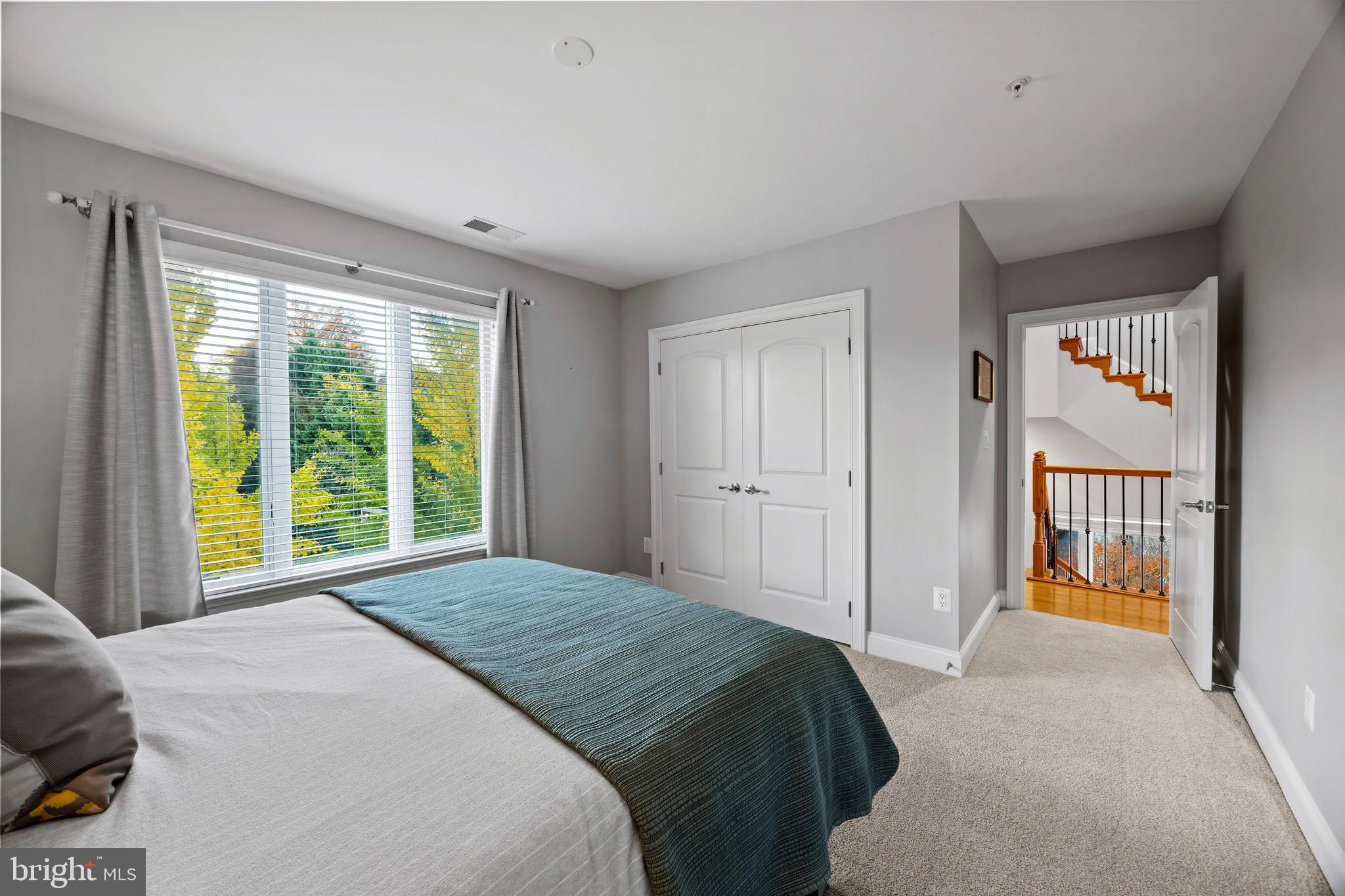 900 Valencia Court, Unit 188 Baltimore, MD 21230 - Photo 43 of 62 a bedroom with a bed and a window