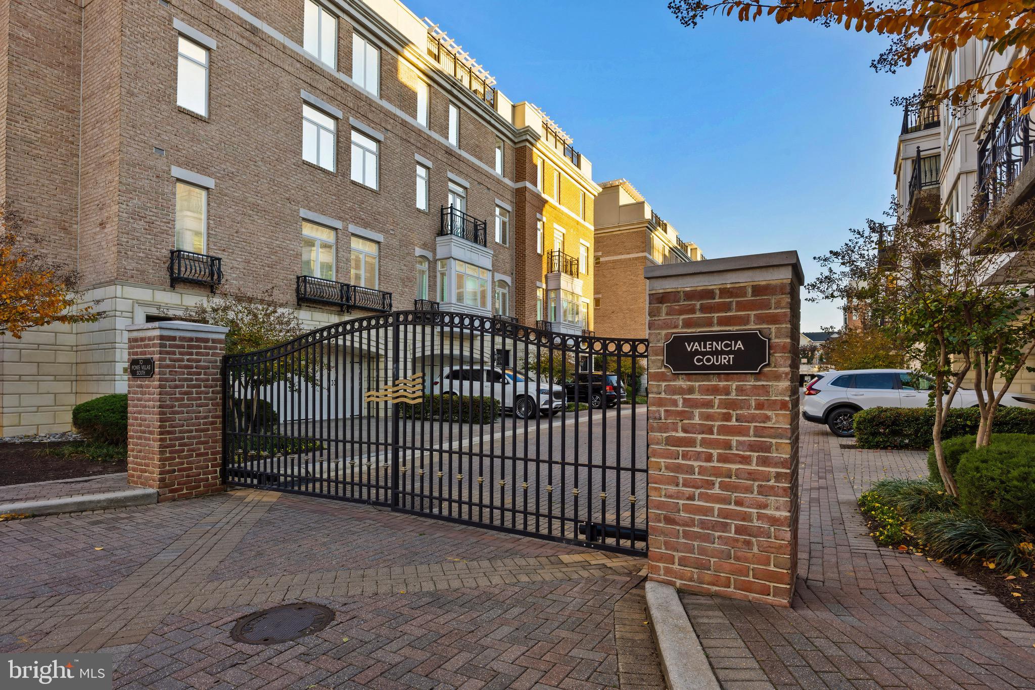 900 Valencia Court, Unit 188 Baltimore, MD 21230 - Photo 7 of 62 a view of a street with brick building