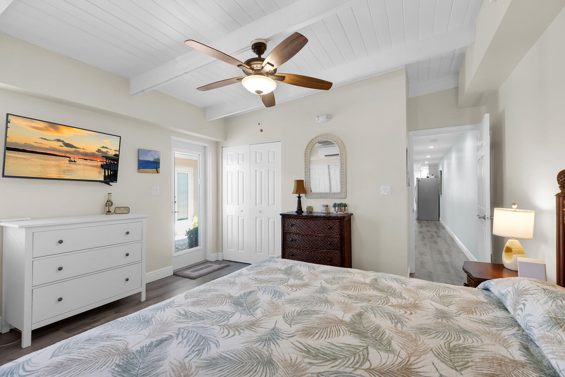 70 7th Street Key Colony Beach, FL 33051 - Photo 15 of 46 a bedroom with a bed and a dresser
