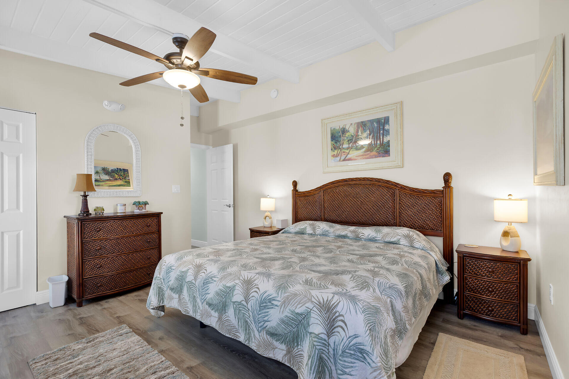 70 7th Street Key Colony Beach, FL 33051 - Photo 16 of 46 a bedroom with a bed and a chandelier
