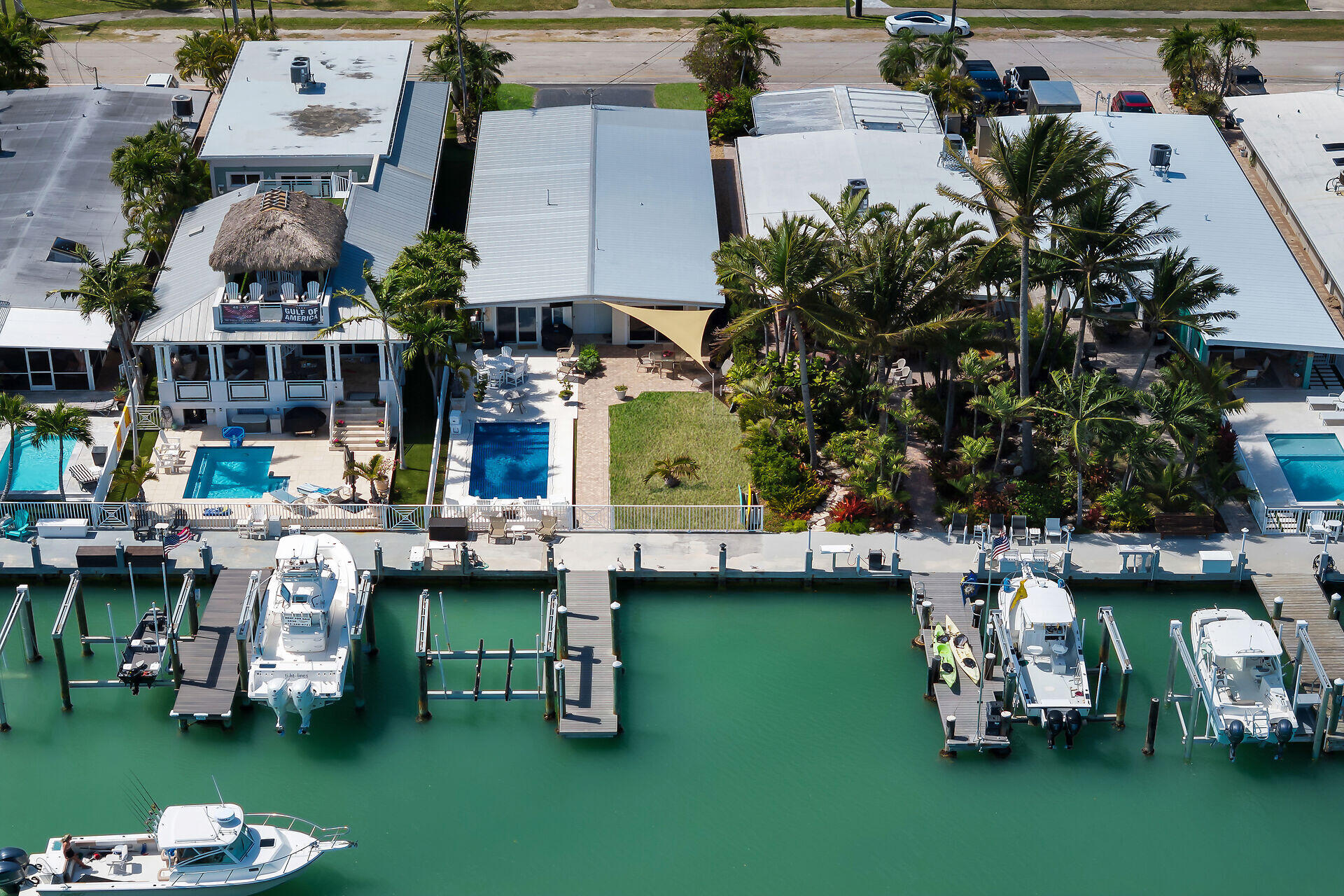 70 7th Street Key Colony Beach, FL 33051 - Photo 25 of 46 an aerial view of a house with swimming pool and a fountain