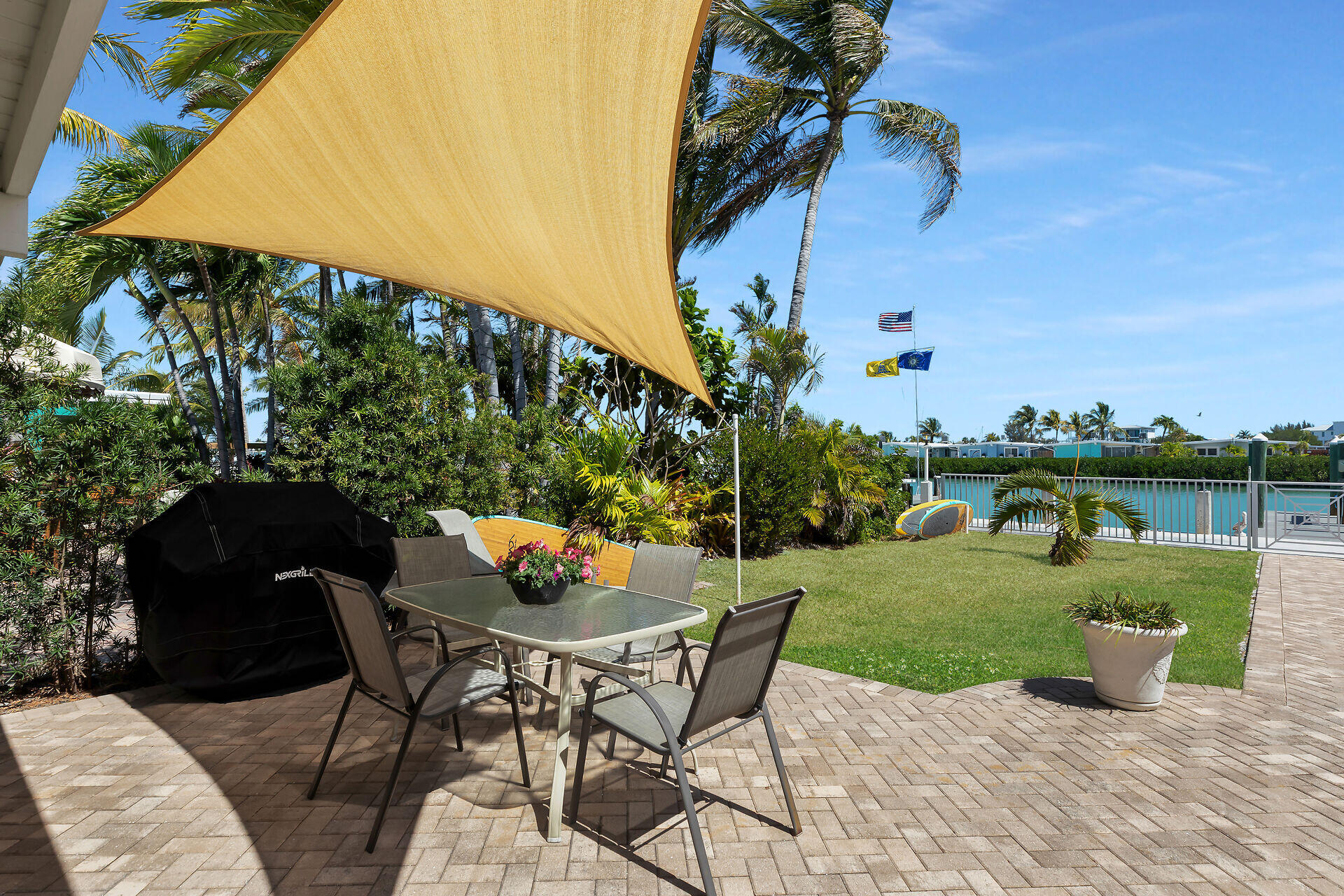 70 7th Street Key Colony Beach, FL 33051 - Photo 30 of 46 a view of a backyard with sitting area