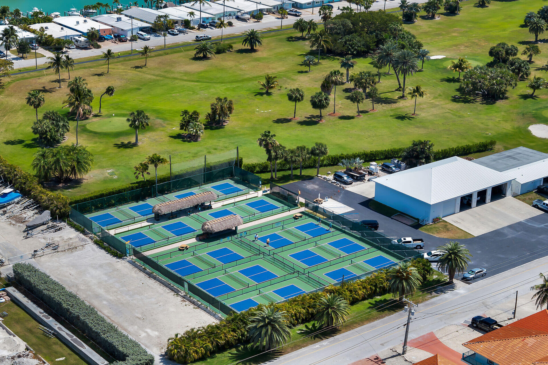 70 7th Street Key Colony Beach, FL 33051 - Photo 34 of 46 an aerial view of a pool lawn chairs and plants