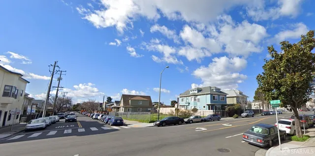a view of a city street from a building
