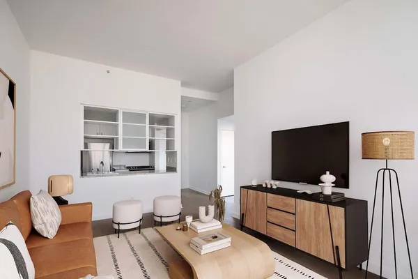 a room with furniture and a flat screen tv