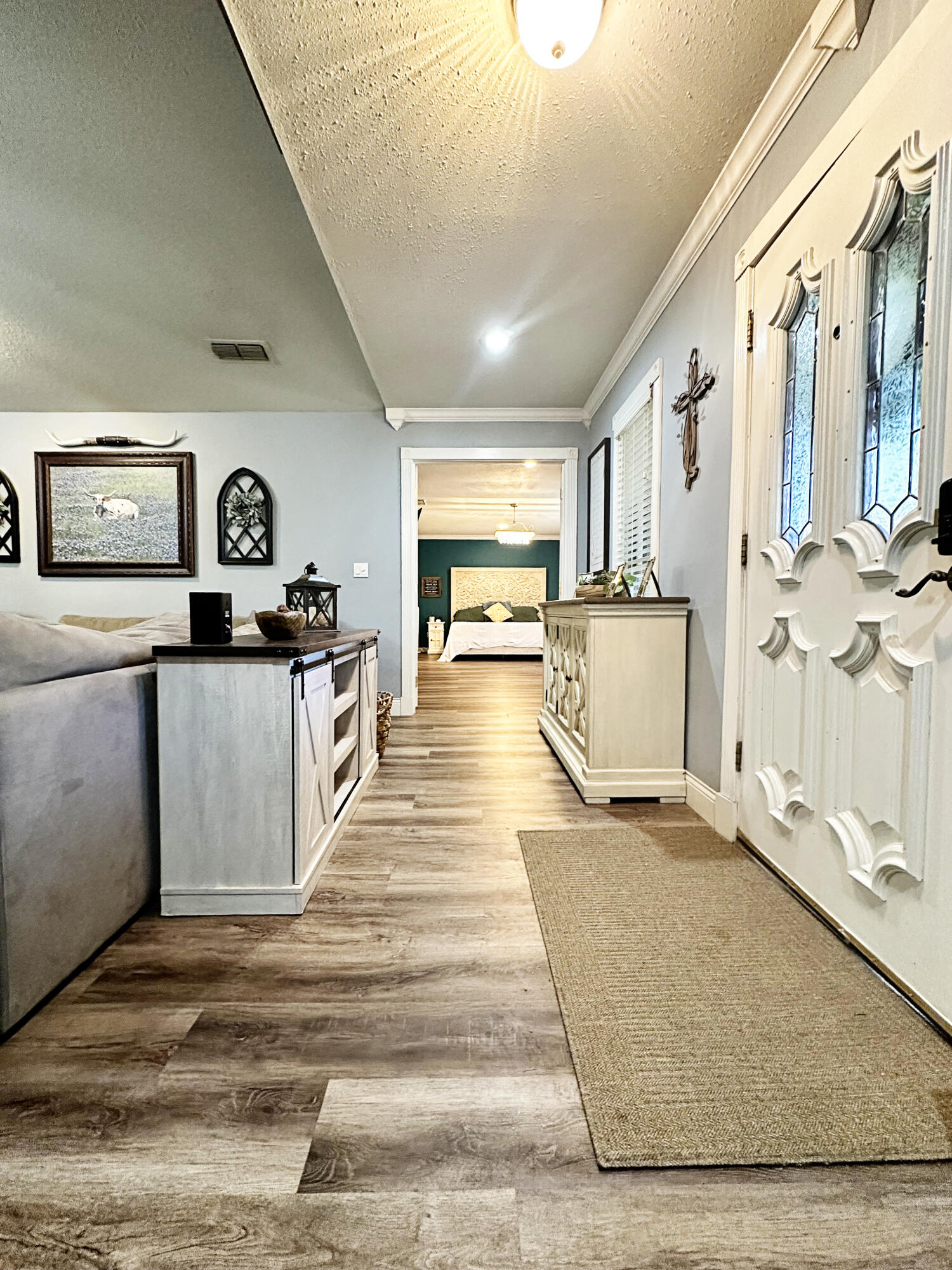 5712 70th Place Lubbock, TX 79424 - Photo 21 of 45 a view of a kitchen with a sink and cabinets