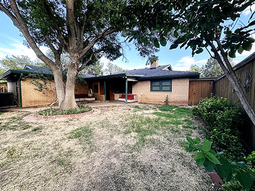 5712 70th Place Lubbock, TX 79424 - Photo 41 of 45 a front view of a house with tree s
