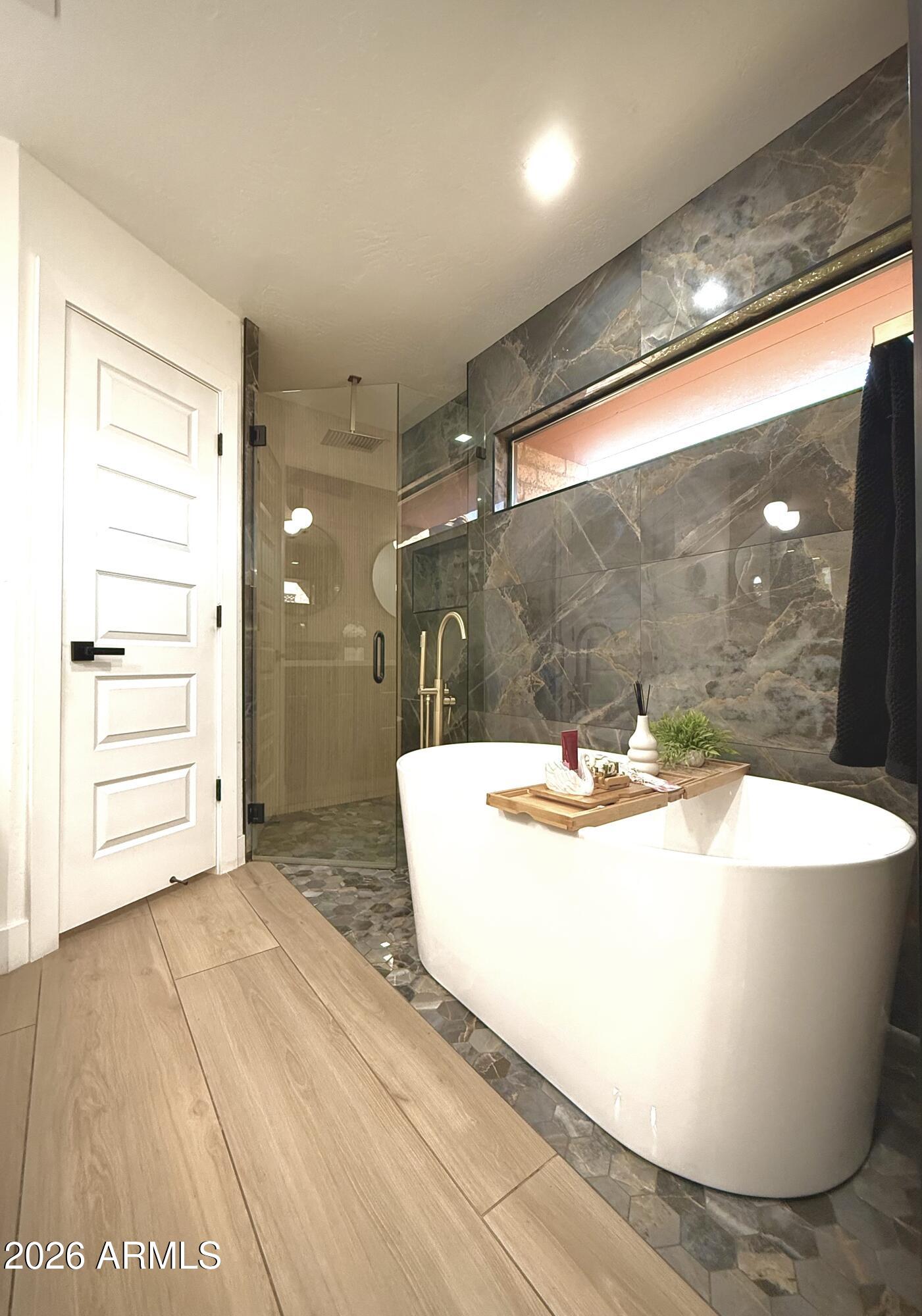 22 West Royal Palm Road Phoenix, AZ 85021 - Photo 16 of 26 a view of a living room with a wooden floor