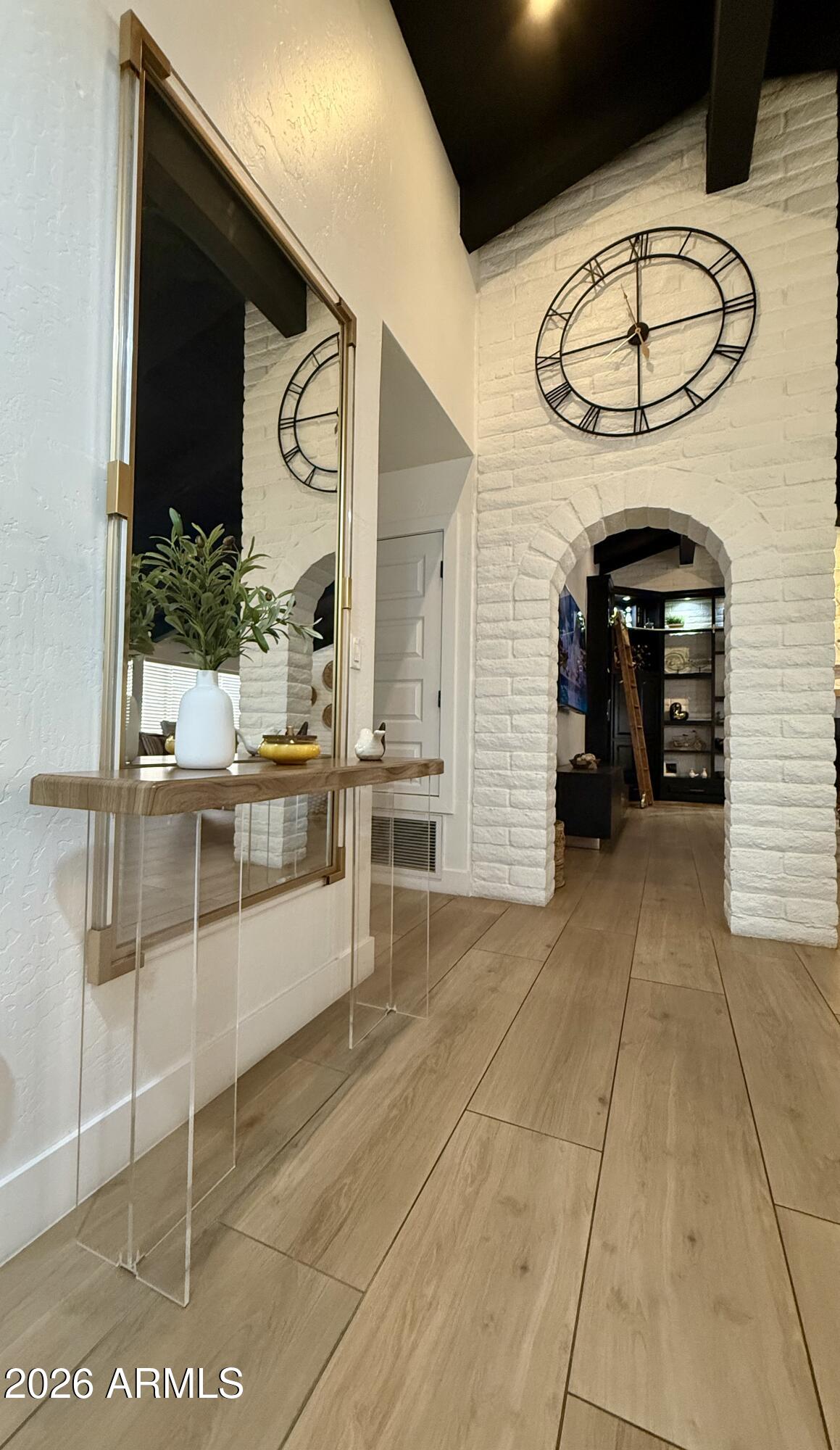 22 West Royal Palm Road Phoenix, AZ 85021 - Photo 3 of 26 a view of a hallway with entryway