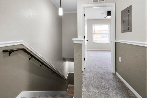 a view of a hallway with entryway