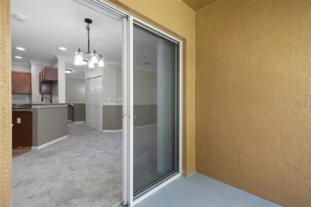 a view of a swimming pool with a yard