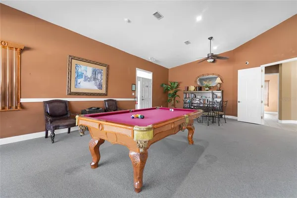 a view of a dining room with furniture