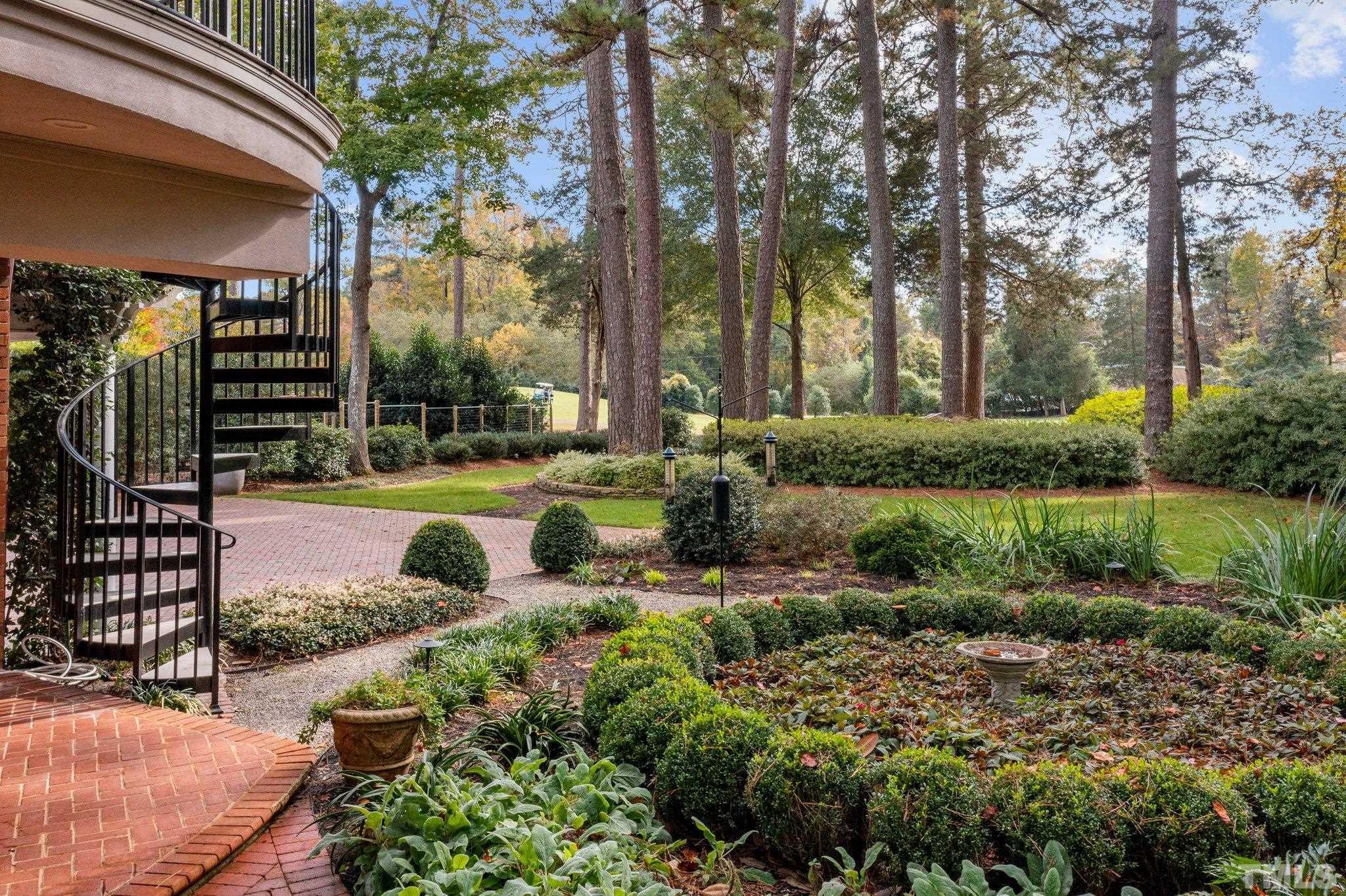 3101 Cornwall Road Durham, NC 27707 - Photo 15 of 30 a view of a garden with an outdoor space
