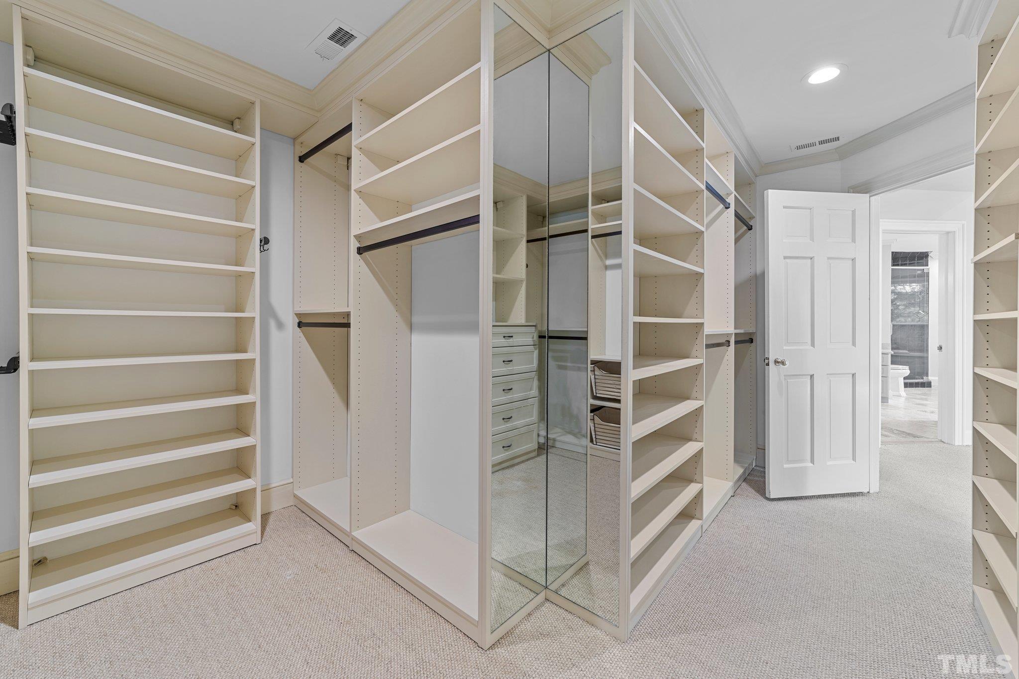 3101 Cornwall Road Durham, NC 27707 - Photo 20 of 30 a view of walk in closet with empty racks