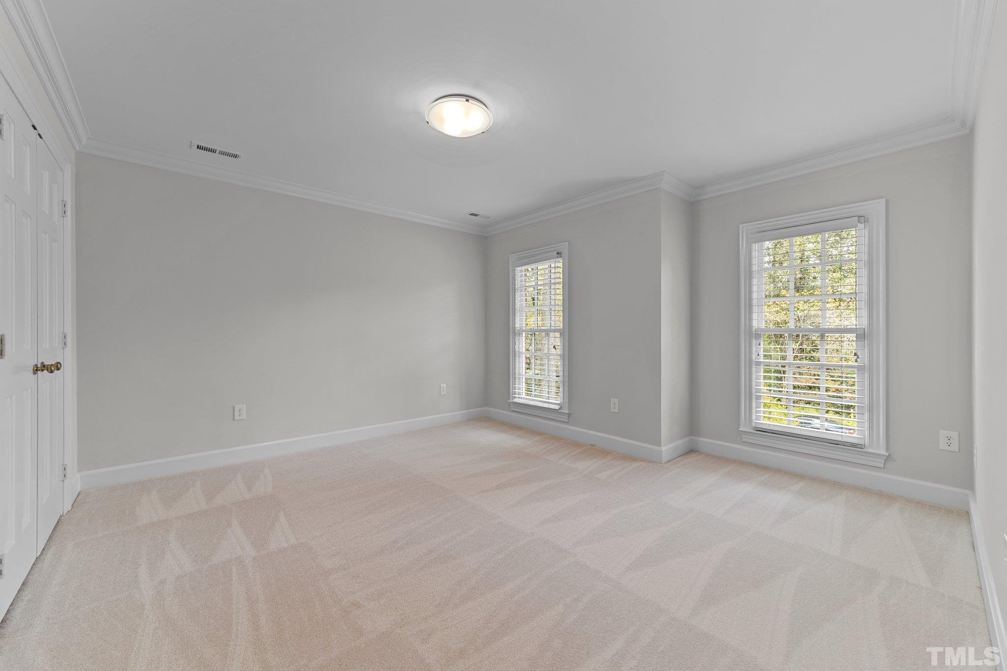 3101 Cornwall Road Durham, NC 27707 - Photo 23 of 30 an empty room with windows