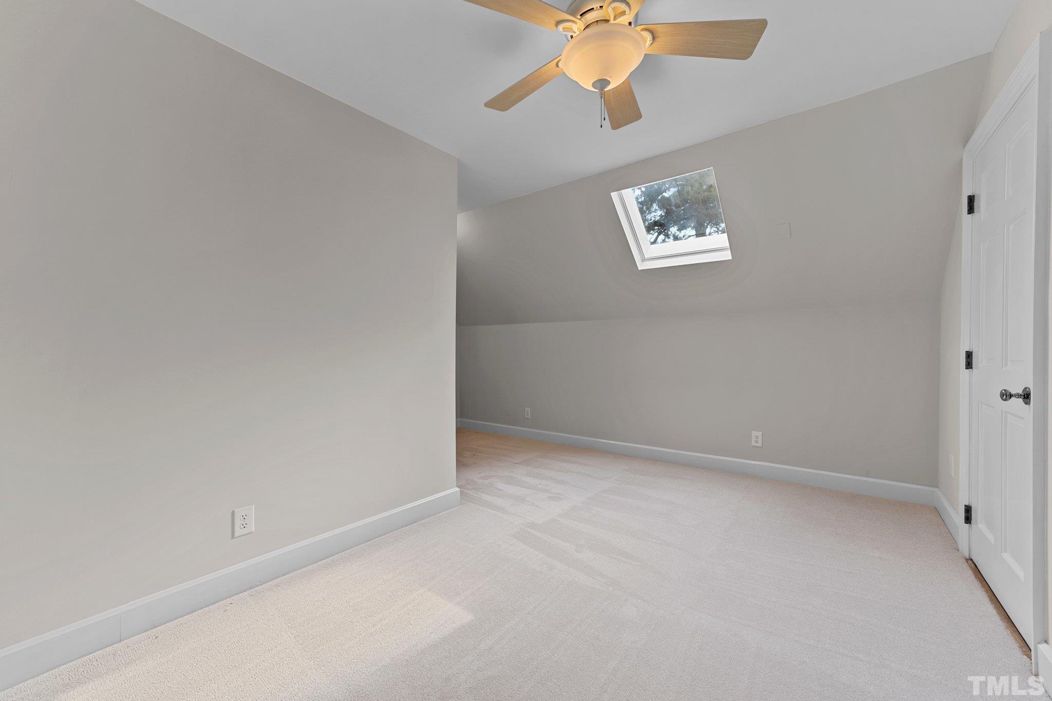 3101 Cornwall Road Durham, NC 27707 - Photo 26 of 30 an empty room with windows and fan