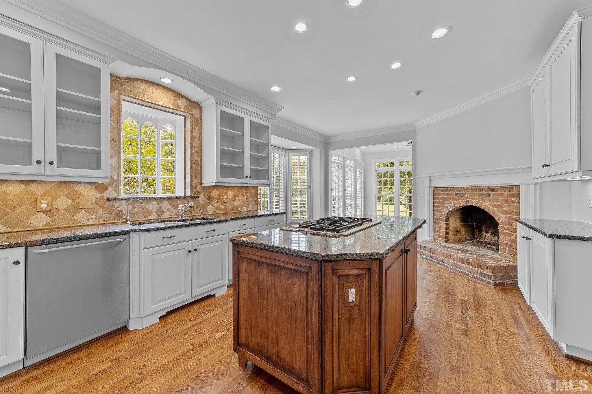 3101 Cornwall Road Durham, NC 27707 - Photo 10 of 30 a kitchen with a stove and a sink