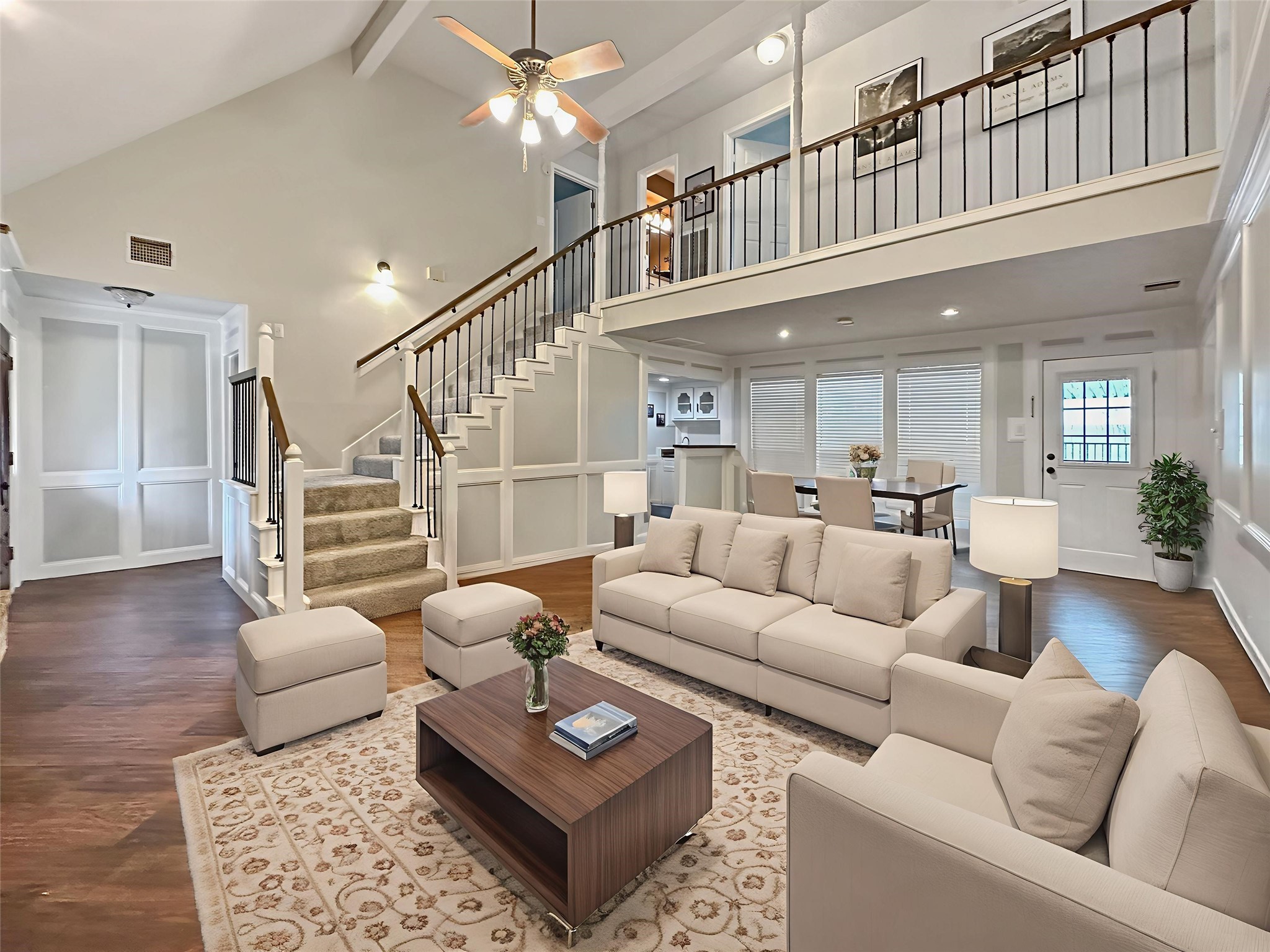17407 Majestic Forest Drive Spring, TX 77379 - Photo 2 of 49 a living room with furniture or couch and a dining table
