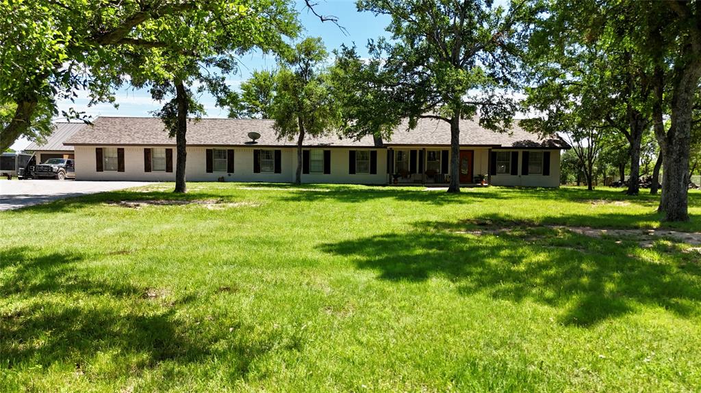 2007 Deep Water Road May, TX 76857 - Photo 4 of 40 a front view of a house with a garden