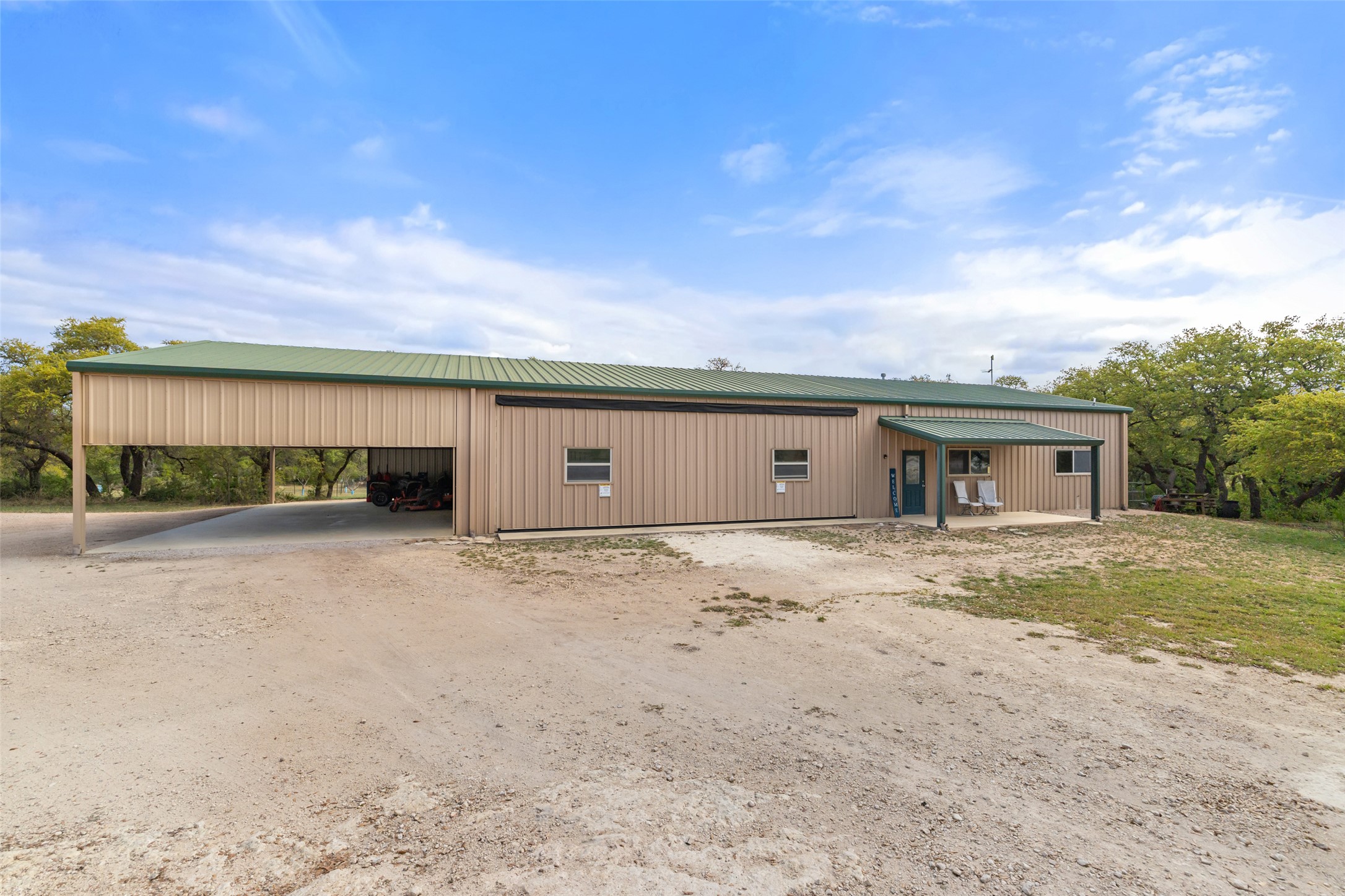 546 Lazy Oak Road Hye, TX 78635 - Photo 26 of 34 a view of a house with a yard