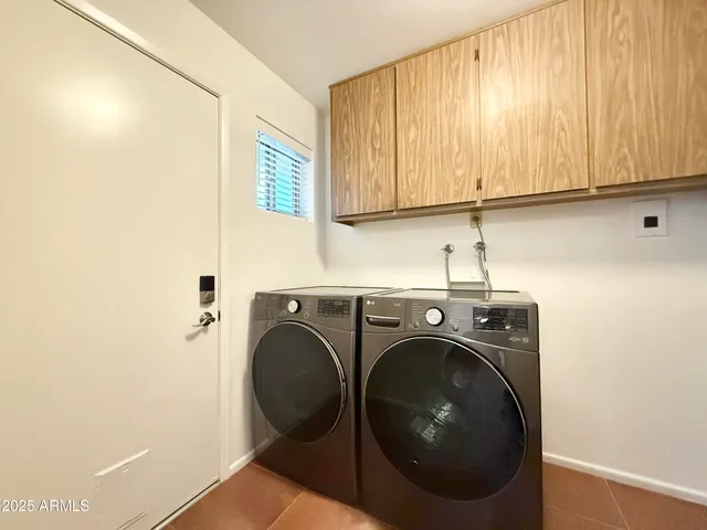 a front view of a house with barbeque area