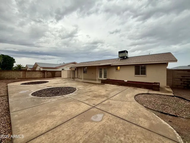 a very nice looking house with a yard