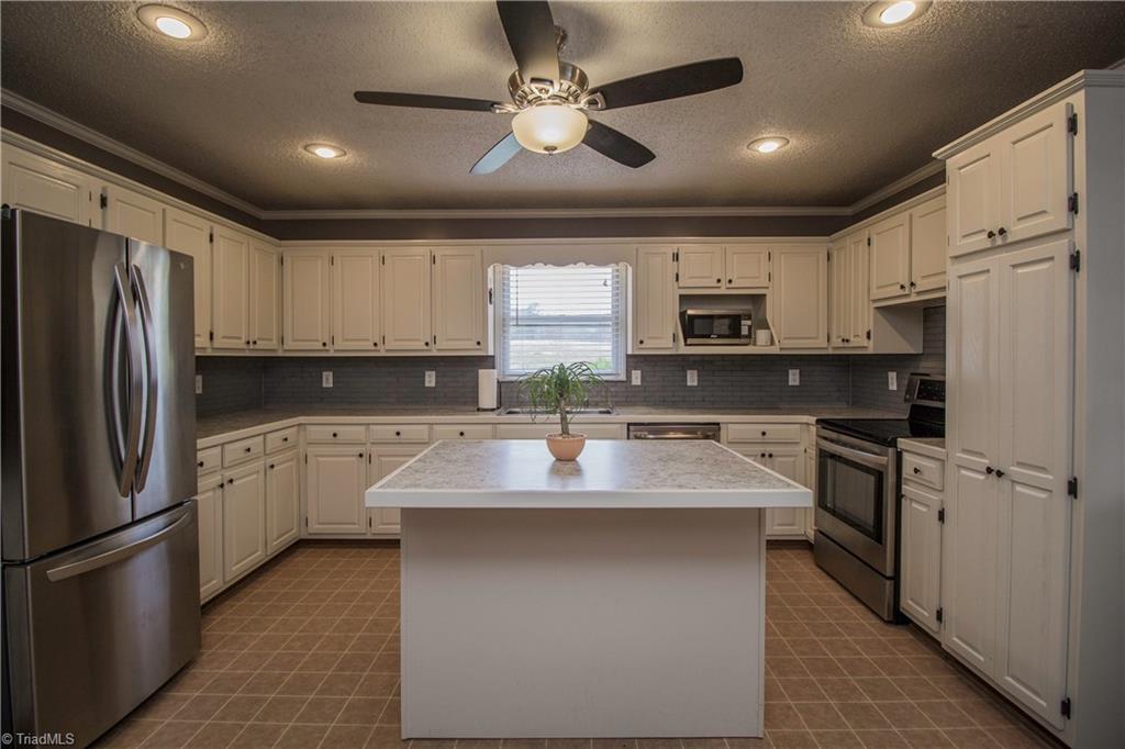 1435 Stewart Road Walnut Cove, NC 27052 - Photo 15 of 30 Kitchen was updated in 2017-2018. Kitchen Appliances remain, including Refrigerator.