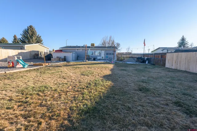 a view of a houses with an outdoor space