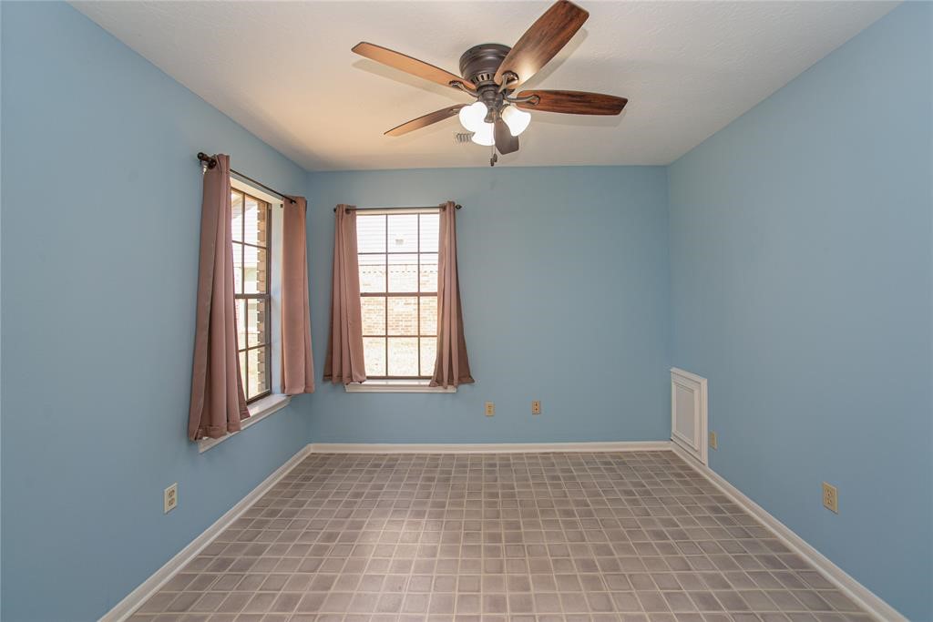28816 South Diamondhead Conroe, TX 77356 - Photo 15 of 23 a view of an empty room with a window