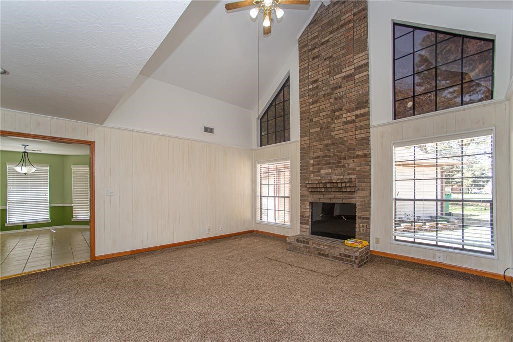 28816 South Diamondhead Conroe, TX 77356 - Photo 4 of 23 an empty room with windows