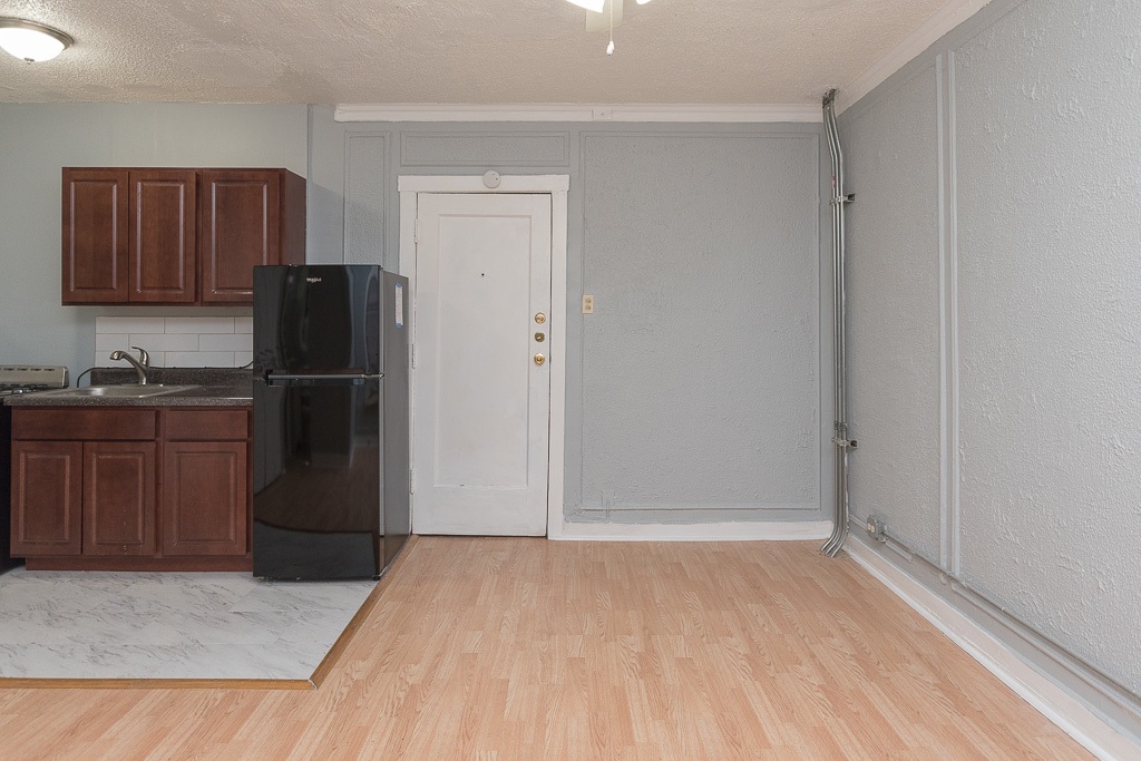 4735 North Beacon Street, Unit 314 Chicago, IL 60640 - Photo 9 of 15 a kitchen with a refrigerator and a sink