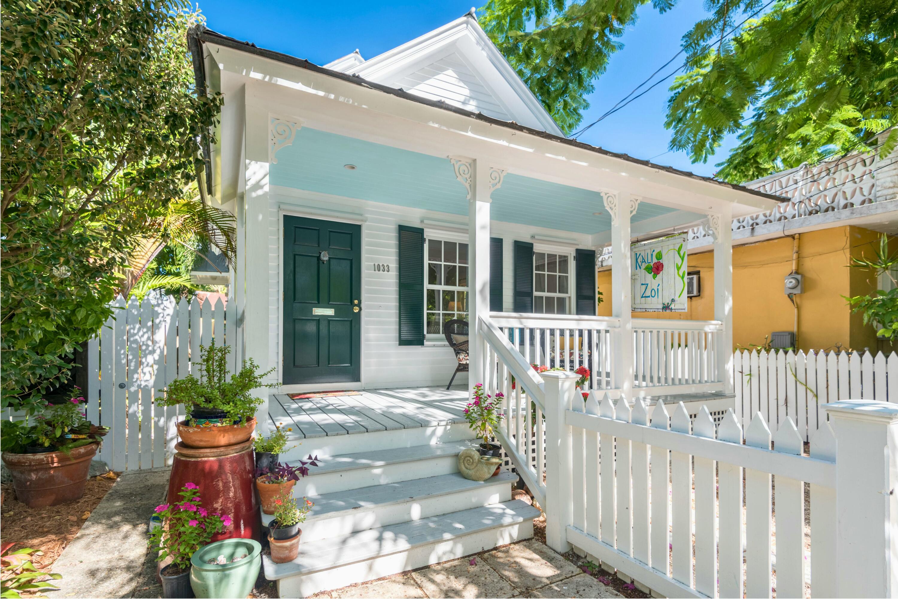 1033 Catherine Street Key West, FL 33040 - Photo 1 of 39 a front view of a house with a porch