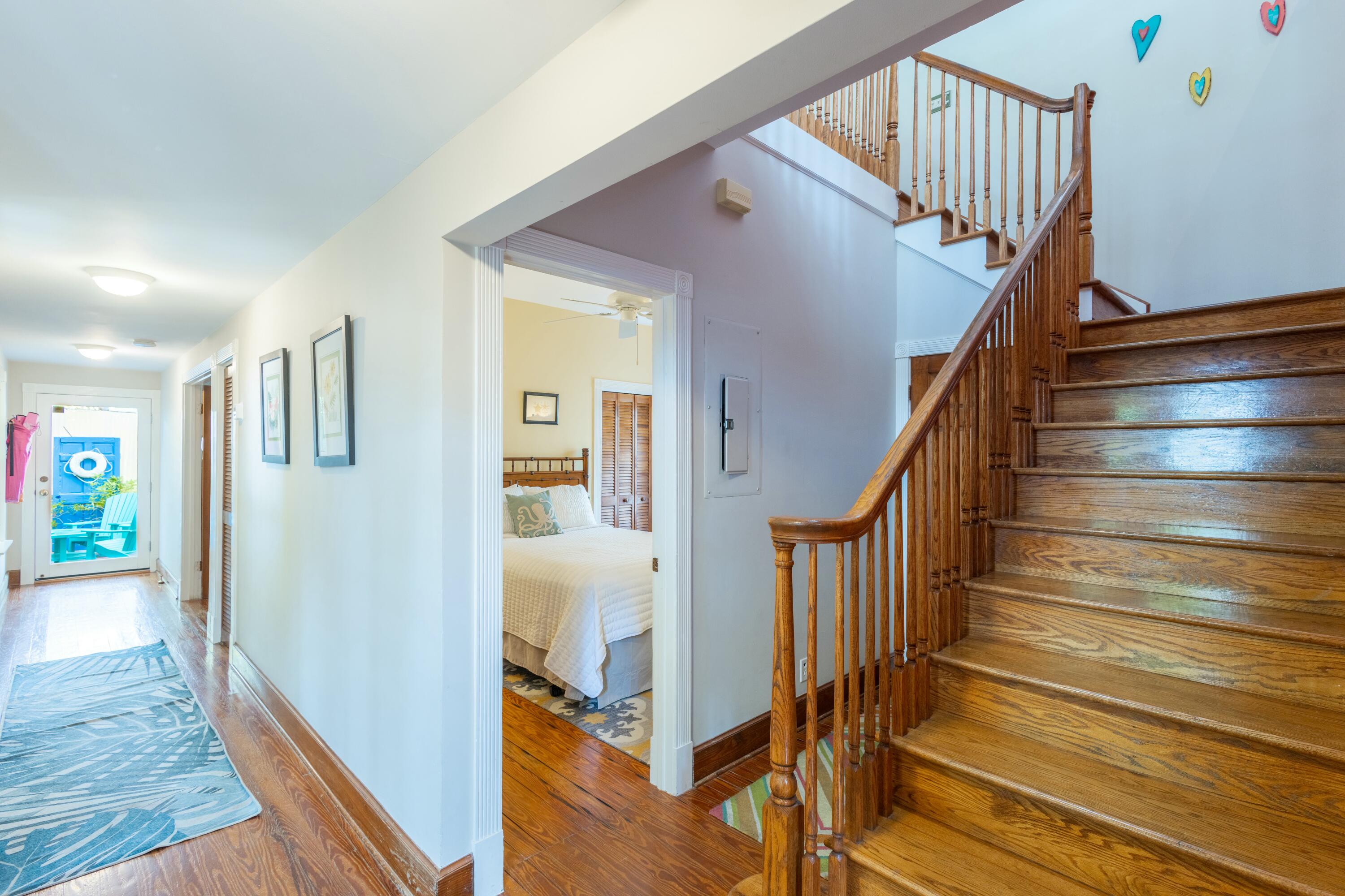 1033 Catherine Street Key West, FL 33040 - Photo 14 of 39 a view of entryway and hall with wooden floor