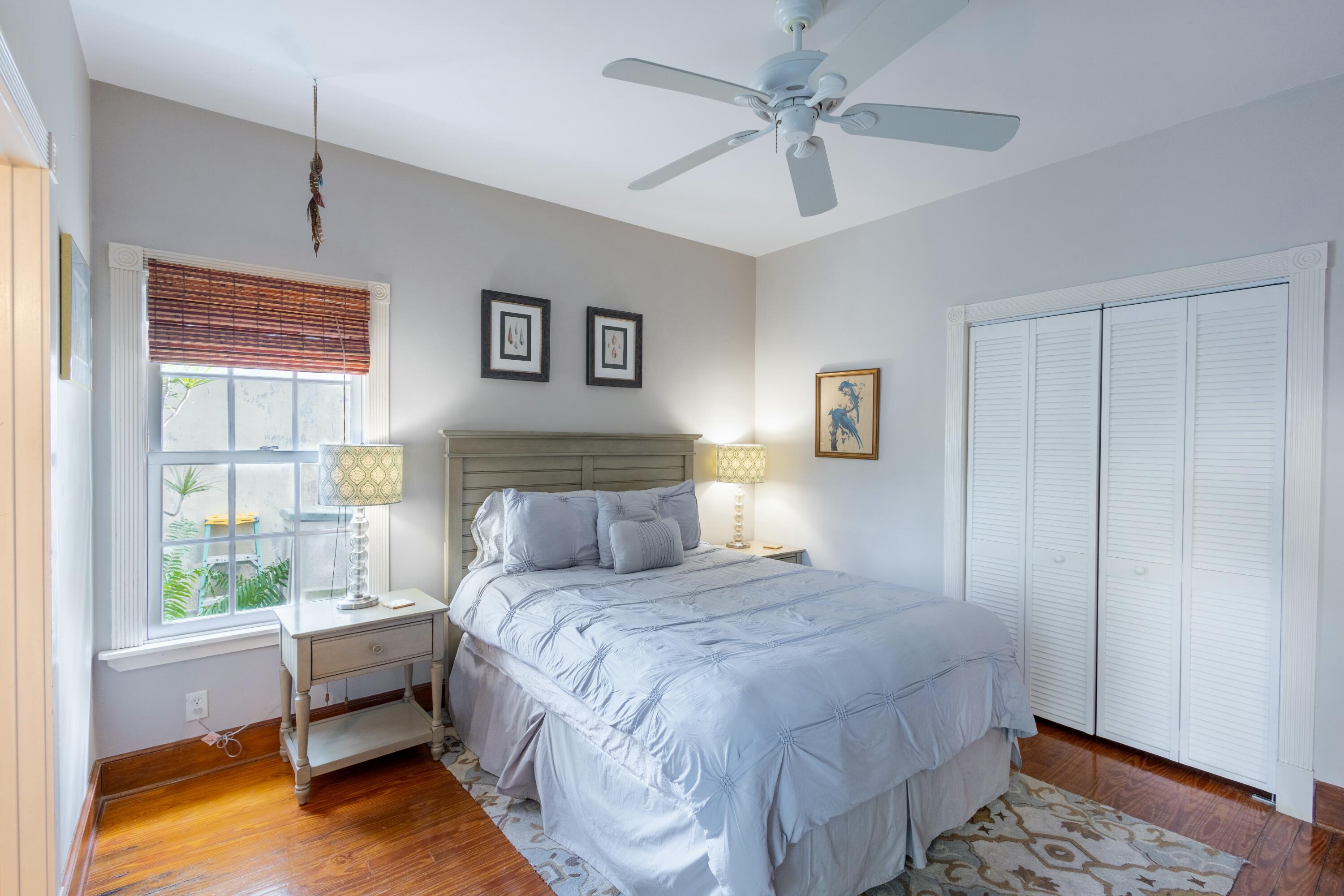 1033 Catherine Street Key West, FL 33040 - Photo 16 of 39 a bedroom with a bed and a window