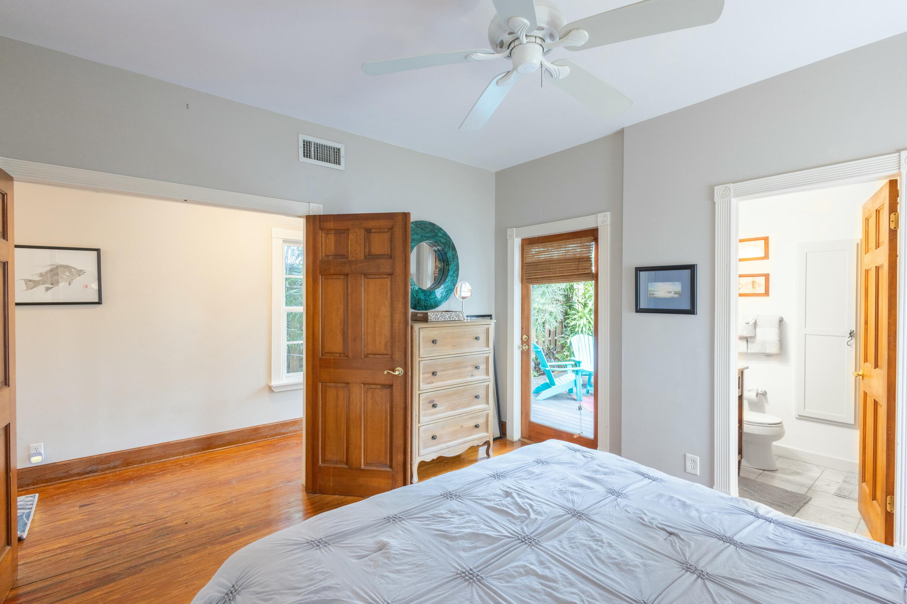 1033 Catherine Street Key West, FL 33040 - Photo 17 of 39 a bedroom with a bed and a window