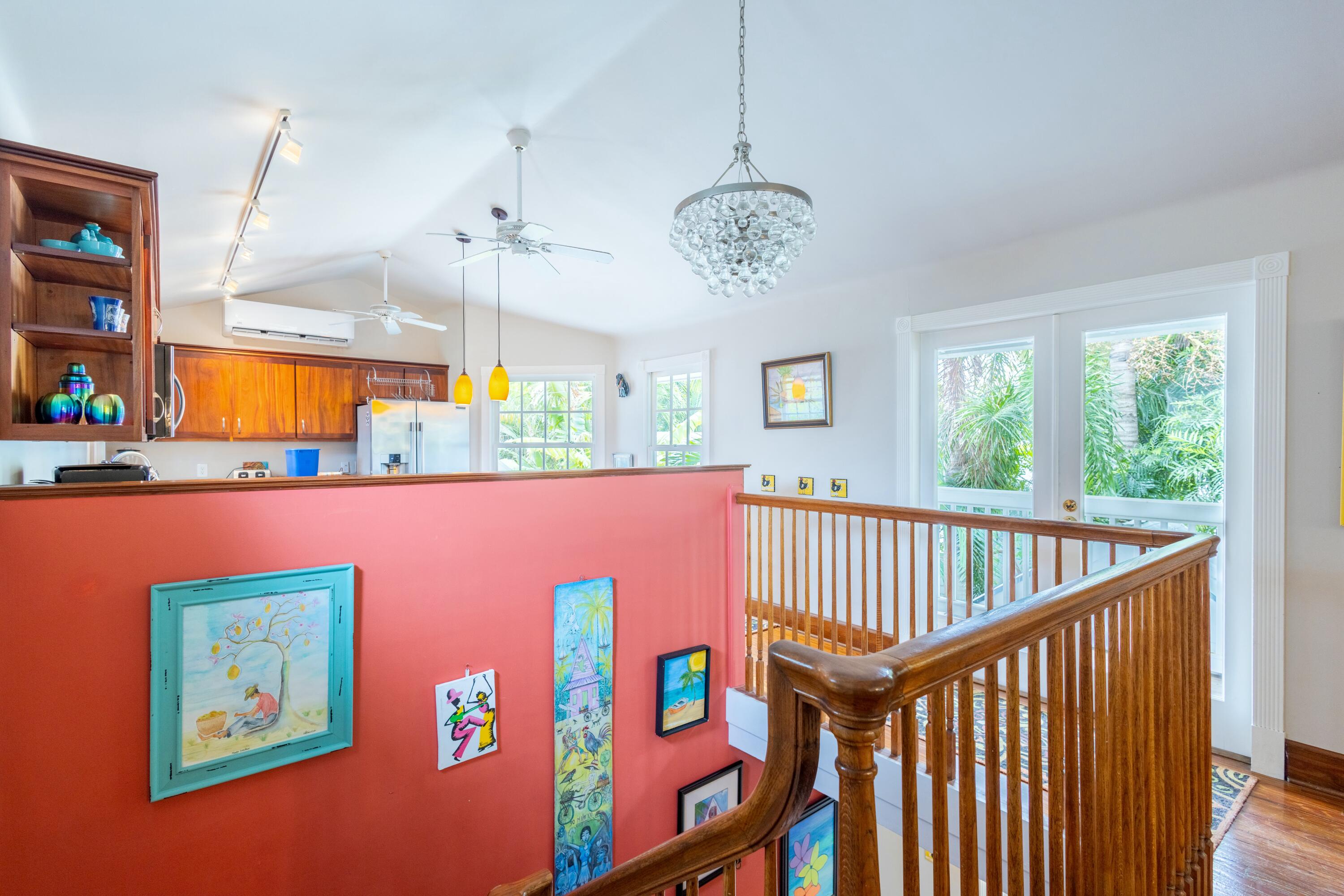 1033 Catherine Street Key West, FL 33040 - Photo 20 of 39 a view of an entryway wooden floor and window