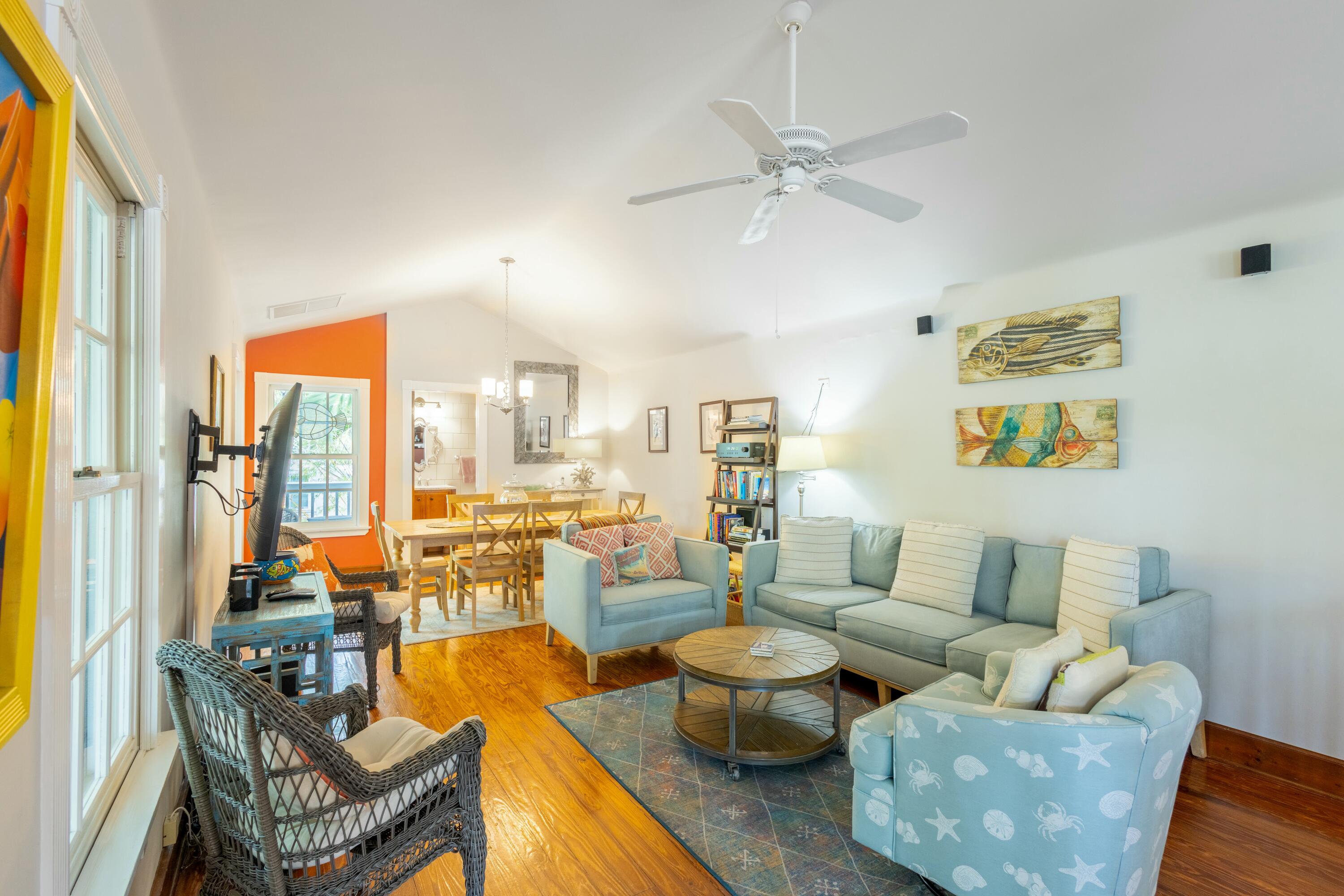 1033 Catherine Street Key West, FL 33040 - Photo 21 of 39 a living room with furniture kitchen view and a large window