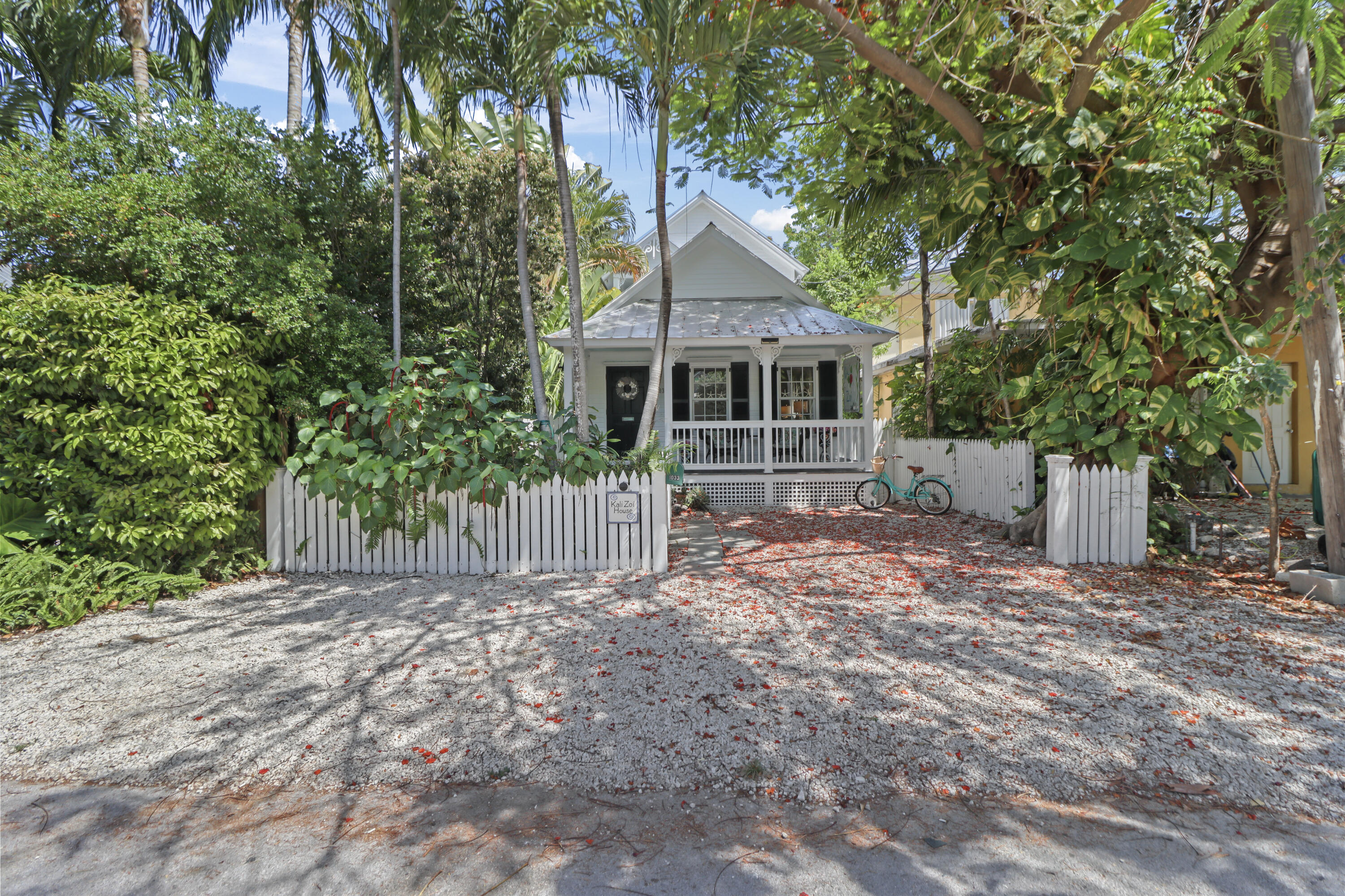 1033 Catherine Street Key West, FL 33040 - Photo 32 of 39 a house with a tree in front of it