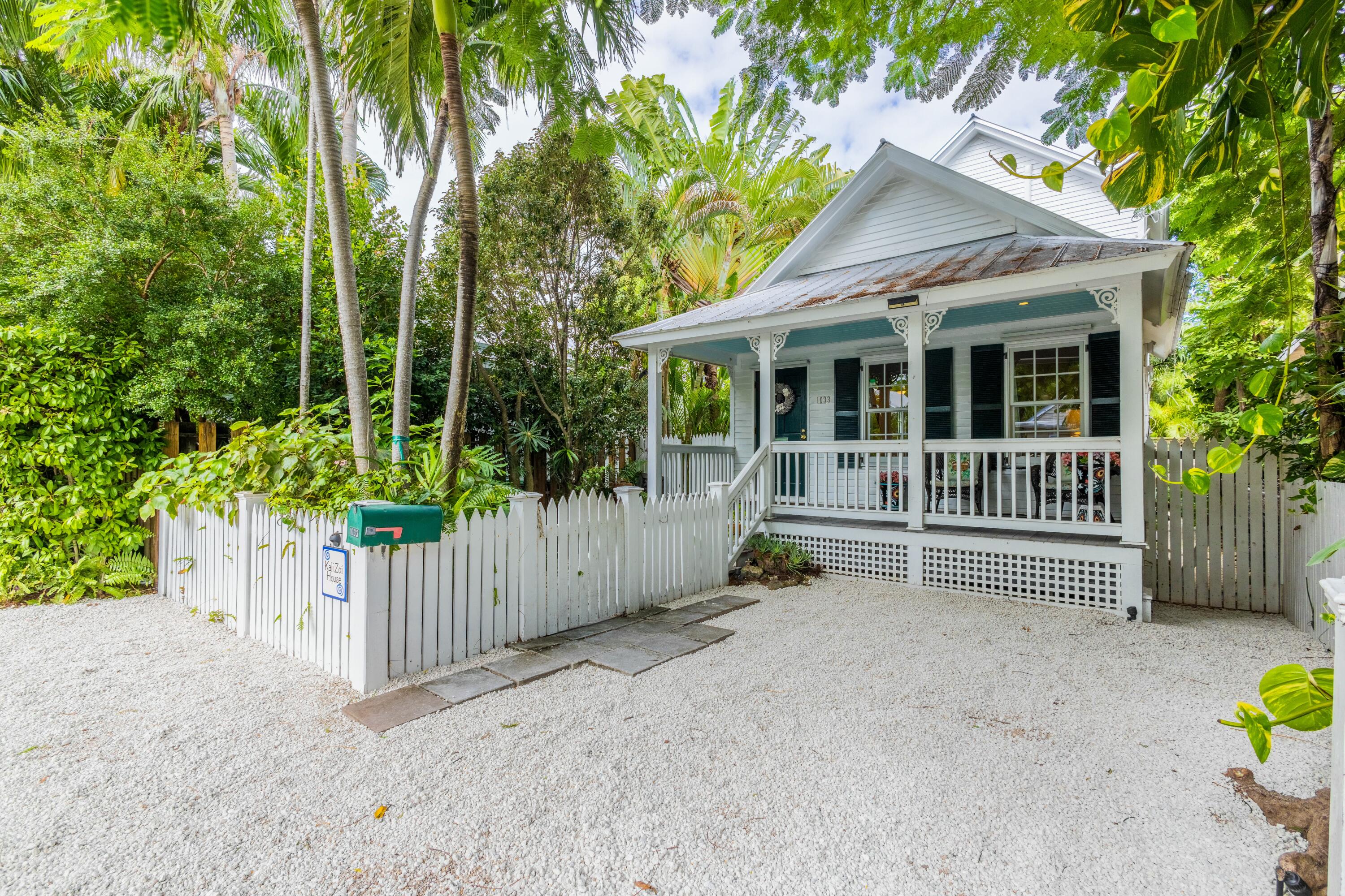 1033 Catherine Street Key West, FL 33040 - Photo 34 of 39 front view of a house with a garden